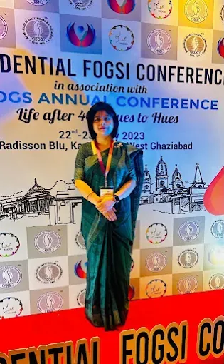 Dr. Bhavya Rathore speaking at a FOGSI conference